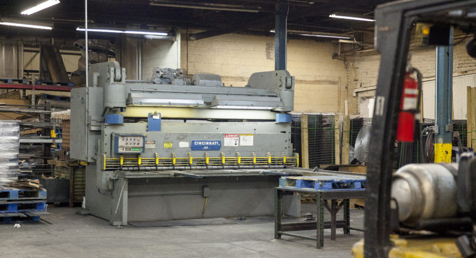 Cincinnati metal shearing equipment in Morgan Li custom fabrication shop