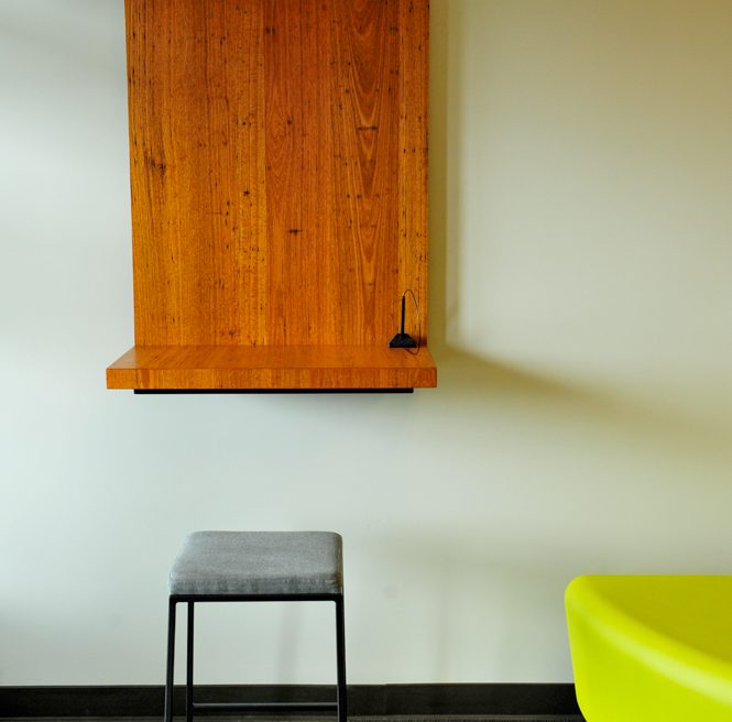 Wall-mounted wood bank desk built by Morgan Li