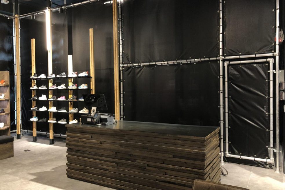 Cashwrap with construction wood built by Morgan Li for Adidas