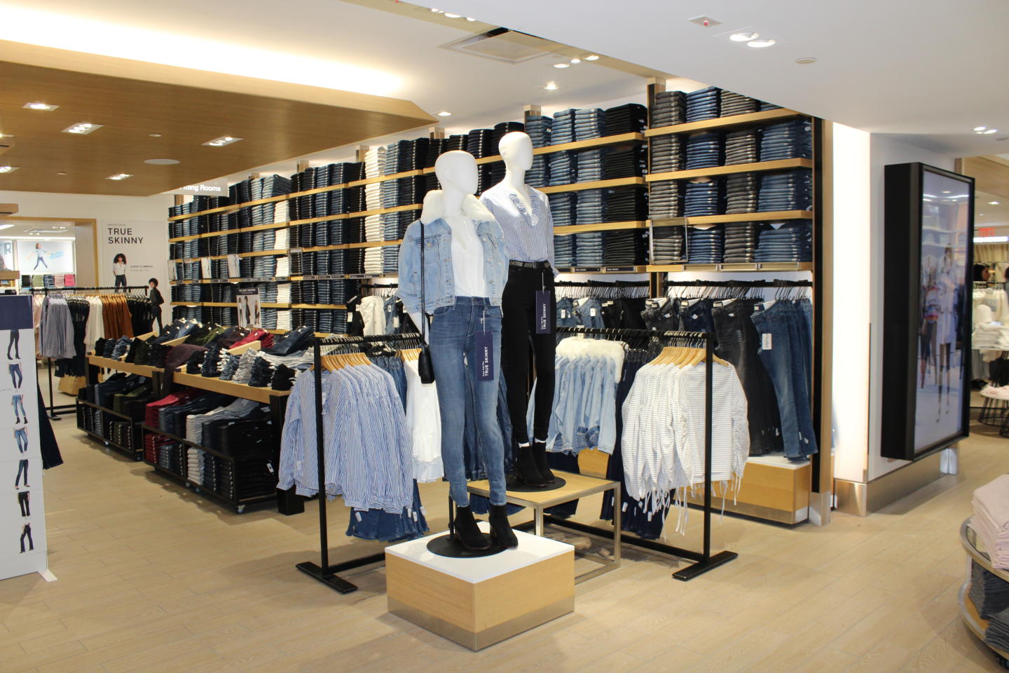 Retail display racks and perimeter jeans display by Morgan Li 