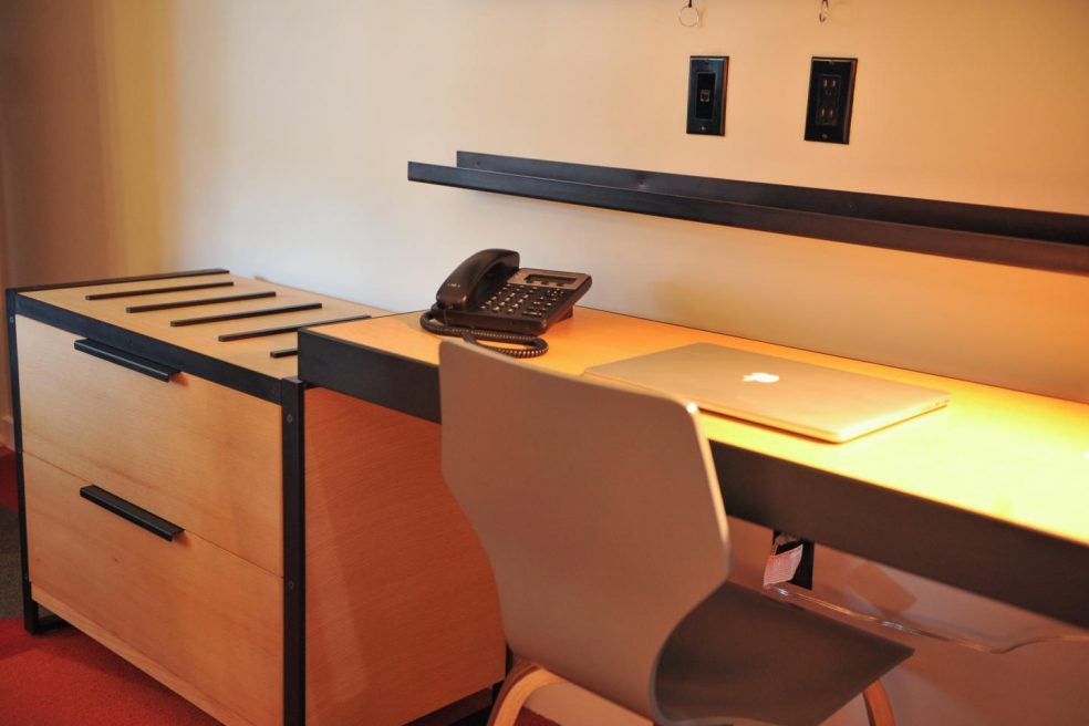 Drawers, desk, and chair by Morgan Li at Infinity Hotel