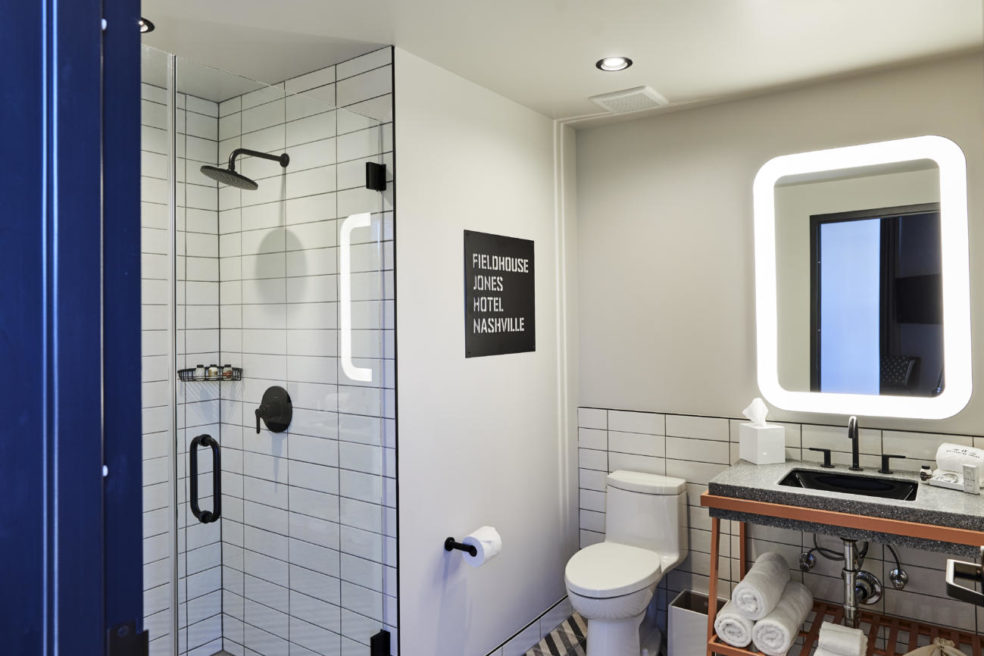 Boutique hotel bathroom with vanities made by Morgan Li Hospitality