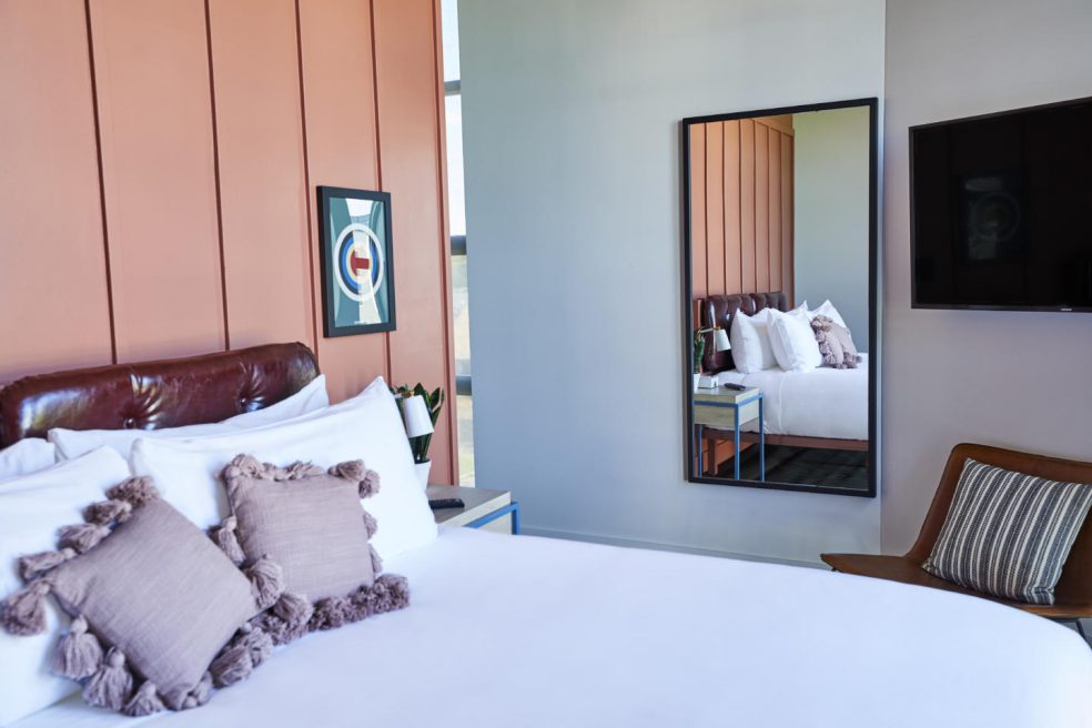 Boutique hotel guest room including milled accent wall at FieldHouse Jones Nashville