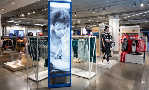 Adidas Signage in floor fixture at shop-in-shop in Macys Herald Square