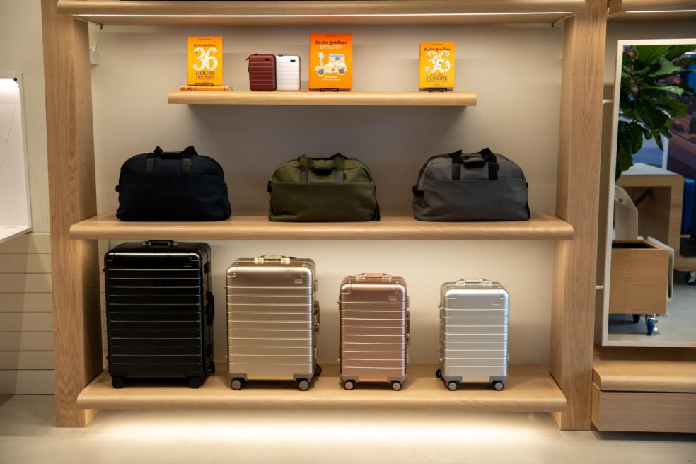 Floor to ceiling luggage display built by Morgan Li for Away Houston