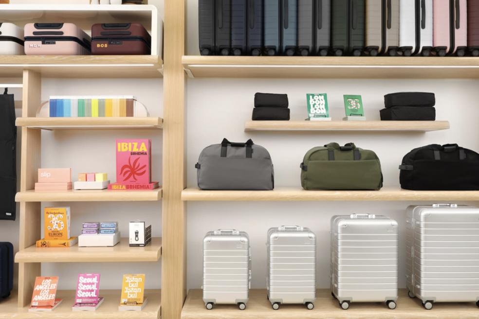 Suitcases and luggage on custom retail display by Morgan Li