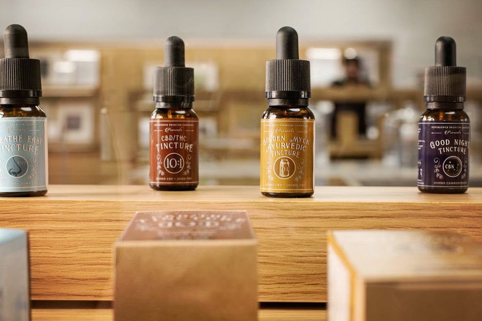 Oils and tinctures on wood retail display