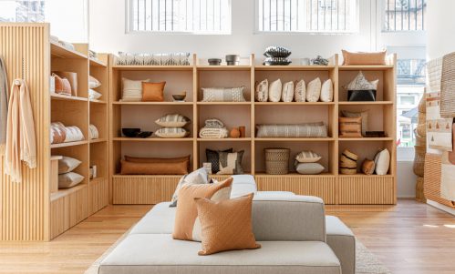 Custom wood floor display with home goods at The Citizenry NYC. Custom fixtures by Morgan Li