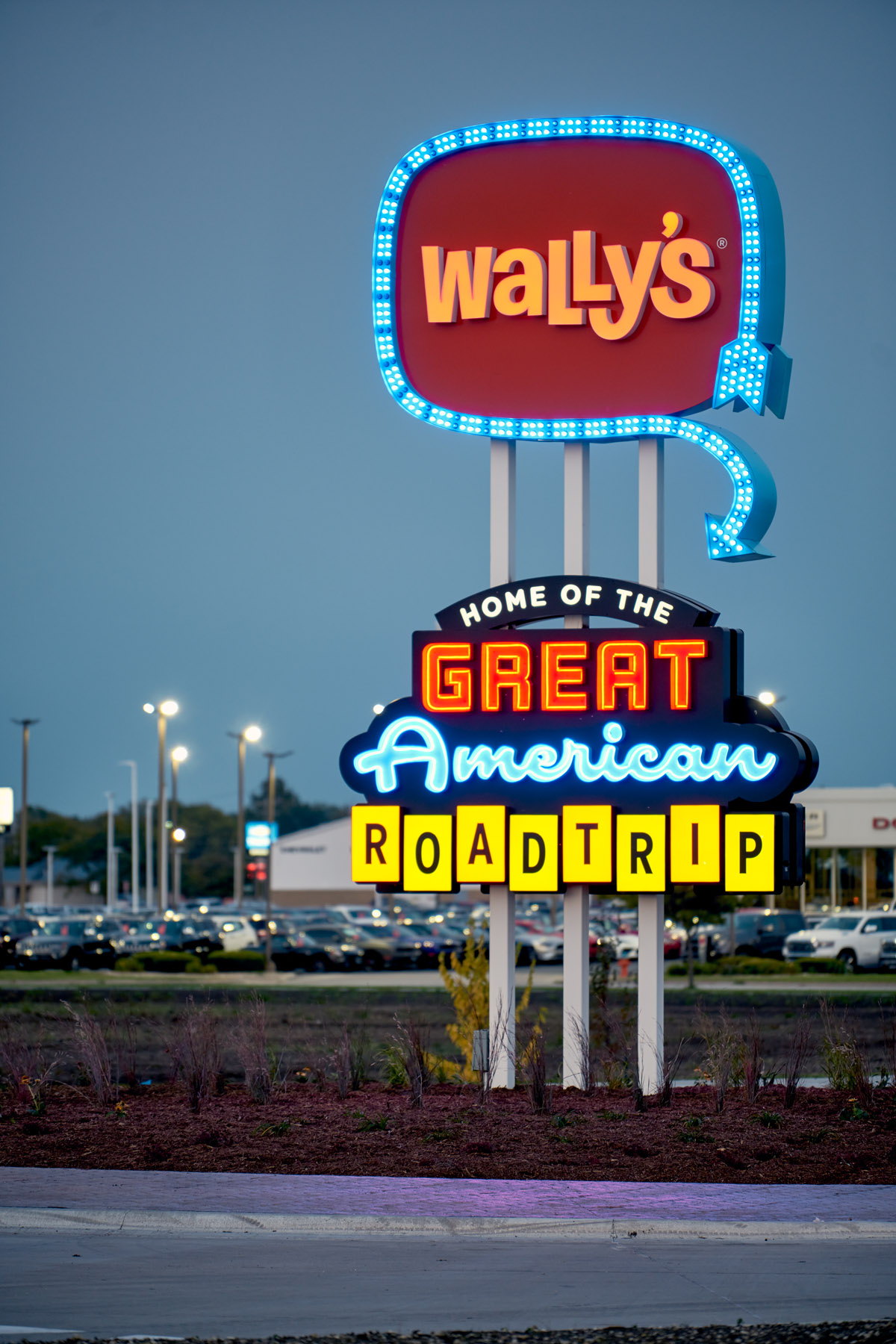 Wally's Home of the Great American Roadtrip sign from roadway. 