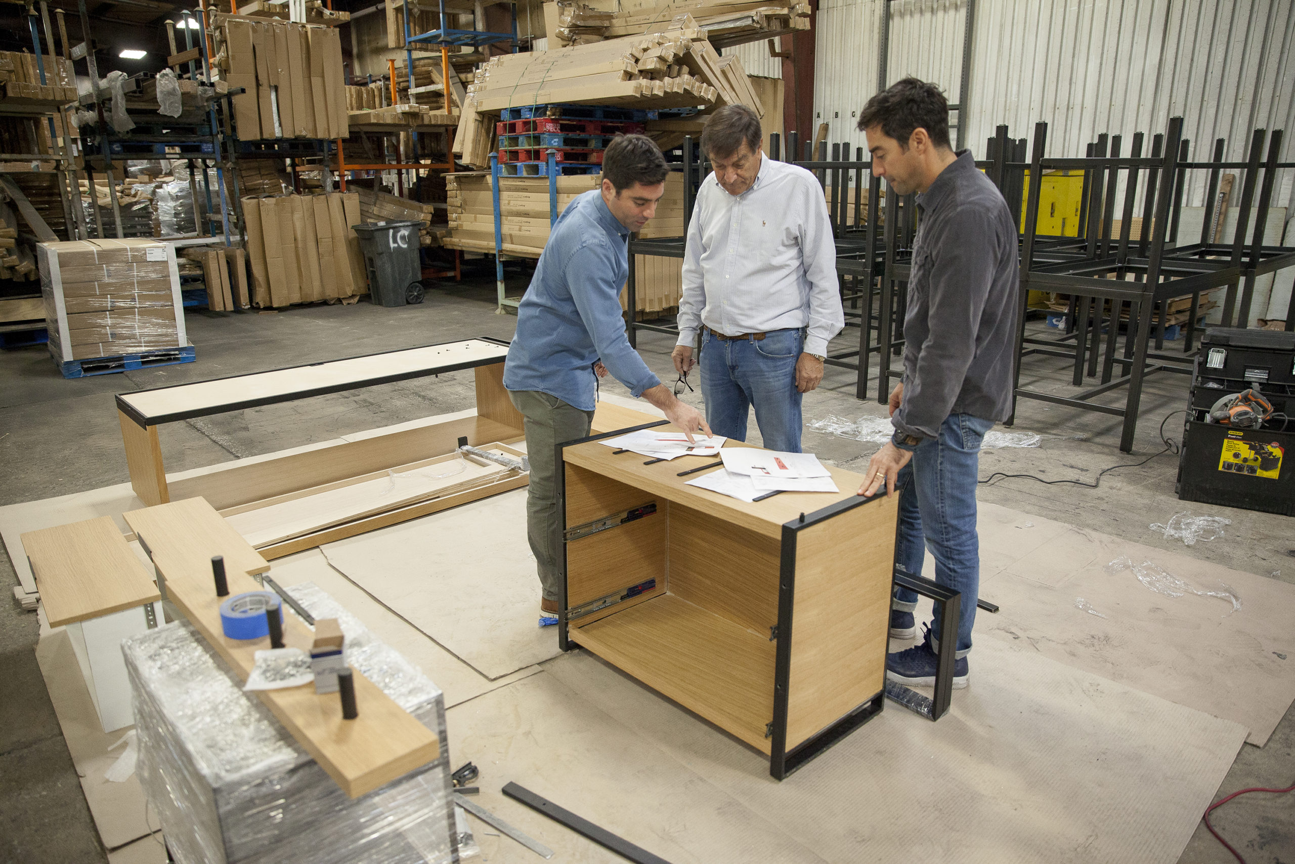 Andy, Jon, and Phil Rosenband discussing plans